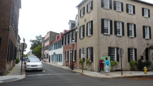 Very early row houses (1740) row houses on Tradd Street running into Church.